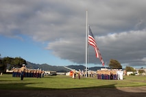 U.S. Marines with Headquarters Battalion, Marine Corps Base Hawaii, stand in formation during the 2023 Klipper Ceremony, MCBH, Dec. 7, 2023. The Klipper Memorial was dedicated in 1981 to honor the 17 U.S. Navy Sailors and two civilian contractors who died during the attack on Naval Air Station Kaneohe Bay on Dec. 7, 1941. (U.S. Marine Corps Photo by Lance Cpl. Tania Guerrero)