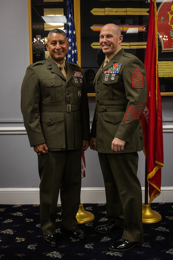 U.S. Marine Corps Brig. Gen. Adolfo Garcia Jr., left, commanding general, and Sgt. Maj. Ryan A. Gnecco, right, sergeant major, both with Marine Corps Installations East-Marine Corps Base (MCIEAST-MCB) Camp Lejeune, pose for a photo after Garcia’s promotion ceremony at The Club at Paradise Point on MCB Camp Lejeune, North Carolina, Dec. 28, 2023. Garcia was promoted to the rank of brigadier general and assumed the duties as commanding general of MCIEAST-MCB Camp Lejeune. (U.S. Marine Corps photo by Cpl. Jennifer E. Douds)