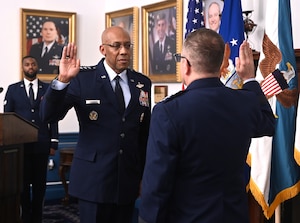 Chairman of the Joint Chiefs of Staff Gen CQ Brown, Jr. administers the Oath of Office to newly appointed Air Force Vice Chief of Staff Gen. Jim Slife during a ceremony at Joint Base Anacostia-Bolling, Washington, D.C., Dec 29, 2023.