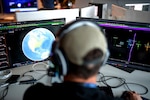 man looking at computer screen