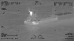 Coast Guard HC-130  Overflight image of the ship shows heat signatures from engine room and exhaust stack. No indication of excessive heat in cargo compartments.