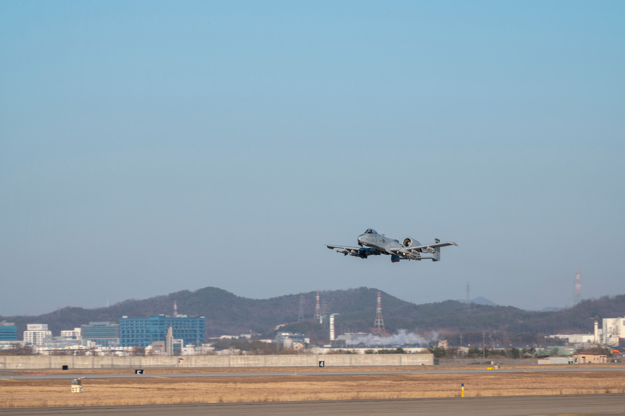 An A-10C Thunderbolt II assigned to the 25th Fighter Squadron takes off at Osan Air Base, Republic of Korea, Jan. 30, 2023. The routine training event is designed to test Osan Airmen’s ability during a heightened state of readiness while providing combat ready forces for close air support, air strike control, forward air control-airborne, combat search and rescue, counter air and fire, and interdiction in the defense of the ROK. (U.S. Air Force Photo by Airman 1st Class Aaron Edwards)