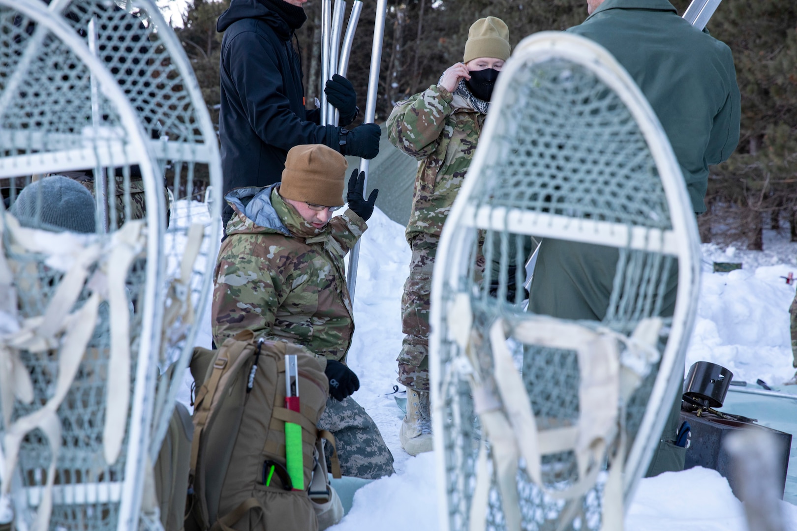 Attendees of the National Guard Arctic Interest Council observe the 133rd Contingency Response Flight, Minnesota Air National Guard, operating in extreme cold during the NG-AIC’s quarterly meeting at the Camp Ripley Training Center Jan. 25, 2023. The NG-AIC is a collaboration among states with arctic interests, capabilities, and resources to address the rapidly changing arctic environment.