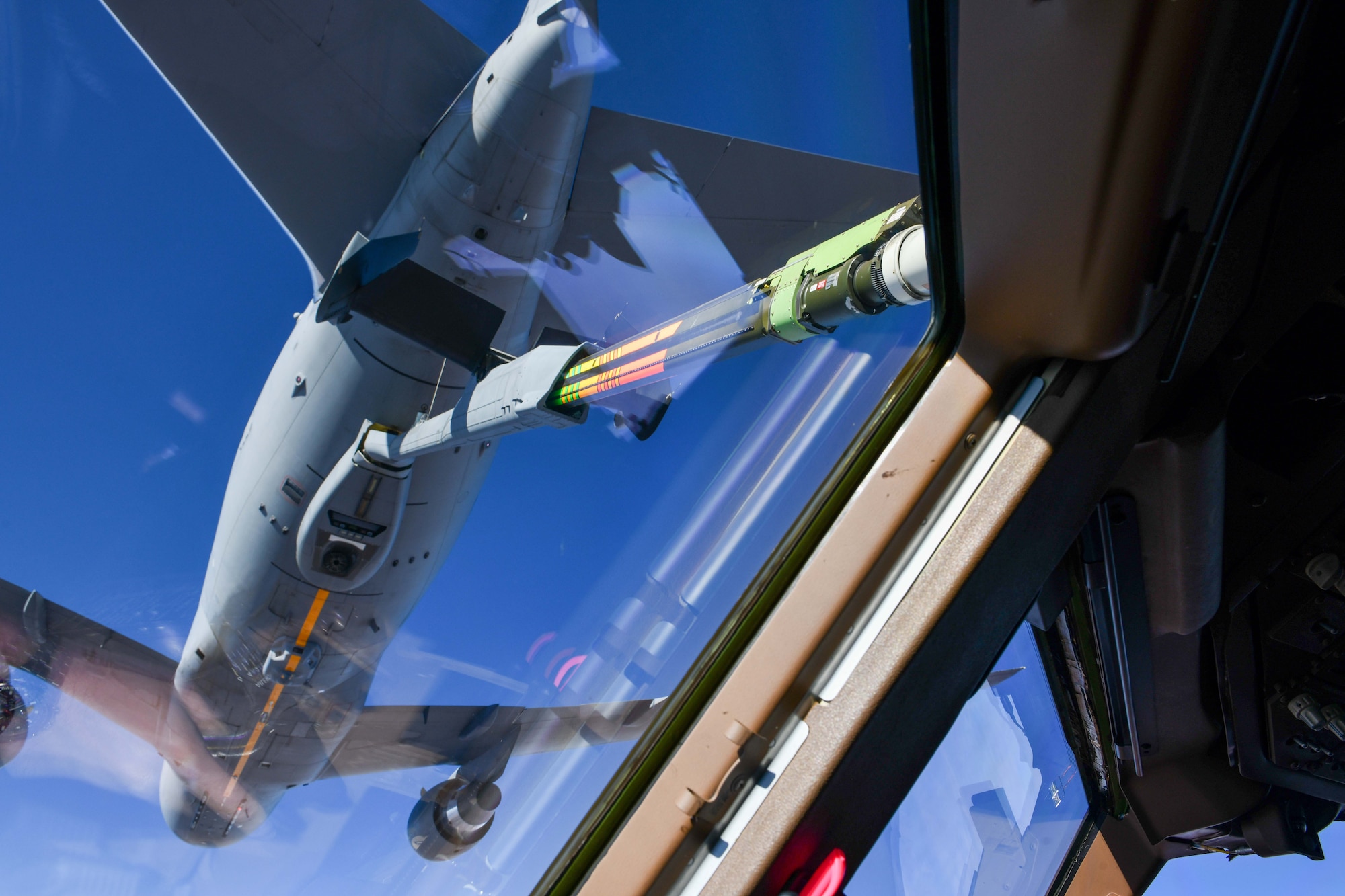 A KC-46 Pegasus from Altus Air Force Base (AFB), Oklahoma, refuels another KC-46 while en route to Travis AFB, Calif., Jan. 20, 2023. The KC-46 Pegasus is equipped with a refueling boom driven by a fly-by-wire control system. (U.S. Air Force photo by Airman 1st Class Miyah Gray)