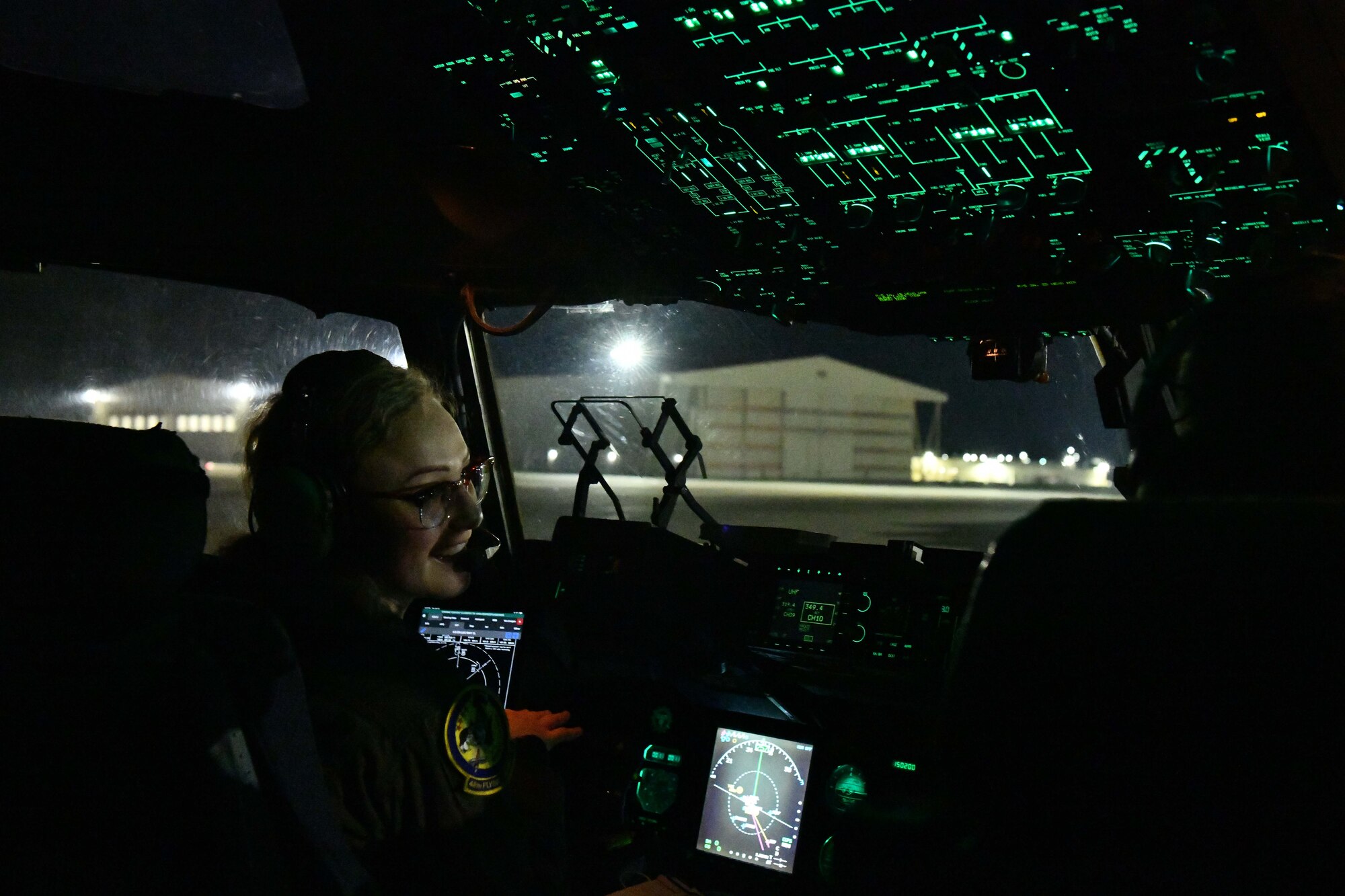 U.S. Air Force Capt. Chrissy McMillan, 58th Airlift Squadron (AS) student pilot, speaks to Capt. Dylan Radka, 58th AS instructor pilot, prior to taking off in a C-17 Globemaster III at Travis Air Force Base, California, Jan. 24, 2023. The crew completed more than eight flying hours during off-station training due to inclement weather. (U.S. Air Force photo by Airman 1st Class Miyah Gray)