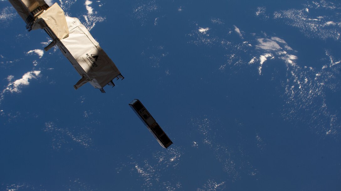 A sensor experiment named Gridded Retarding Ion Drift Sensor deploys from the International Space Station Dec. 29, 2022. The sensor, developed by the Air Force Research Laboratory’s Space Vehicles Directorate is hosted on NASA’s six-unit cube satellite petitSat, or Plasma Enhancements in the Ionosphere-Thermosphere Satellite. PetitSat will study a layer in Earth’s upper atmosphere known as the ionosphere to provide insight on space weather disturbances and their impact on navigation and communication systems. NASA's Heliophysics SPORT CubeSat, also studying the ionosphere, is seen in the top left corner.