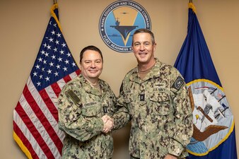 Chief of Naval Personnel Vice Adm. Rick Cheeseman, left, poses for a photograph with Rear Adm. Pete Garvin, commander, Naval Education and Training Command (NETC), as part of a visit to Pensacola area NETC commands, Jan. 26, 2023. NETC's mission is to recruit, train and deliver those who serve our nation, taking them from street-to-fleet by transforming civilians into highly skilled, operational and combat ready warfighters. (United States Navy photo by Mass Communication Specialist 2nd Class Zachary Melvin)