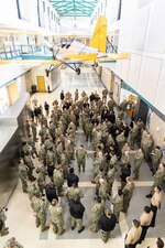 Chief of Naval Personnel Vice Adm. Rick Cheeseman, center, speaks with Sailors assigned to Naval Air Technical Training Center (NATTC) during a tour of NATTC as part of a visit to Pensacola area Naval Education and Training Commands (NETC), Jan. 26, 2023. NETC's mission is to recruit, train and deliver those who serve our nation, taking them from street-to-fleet by transforming civilians into highly skilled, operational and combat ready warfighters. (United States Navy photo by Mass Communication Specialist 2nd Class Zachary Melvin)
