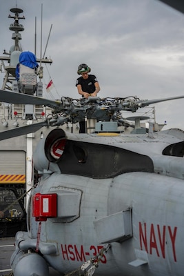 Helicopter Maintenance Aboard USS Oakland