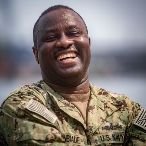 230130-N-DK722-1025 (Jan. 30, 2023) LAGOS, Nigeria – U.S. Navy Lt. Victor Agunbiade, the Nigerian country lead for exercise Obangame Express 2023, poses for a photo in Western Naval Command in Lagos, Nigeria, Jan. 30, 2023, during Obangame Express 2023. Obangame Express 2023, conducted by U.S. Naval Forces Africa, is a maritime exercise designed to improve cooperation, and increase maritime safety and security among participating nations in the Gulf of Guinea and Southern Atlantic Ocean. U.S. Sixth Fleet, headquartered in Naples, Italy, conducts the full spectrum of joint and naval operations, often in concert with allied and interagency partners, in order to advance U.S. national interests and security and stability in Europe and Africa. (U.S. Navy photo by Mass Communication Specialist 1st class Cameron C. Edy)