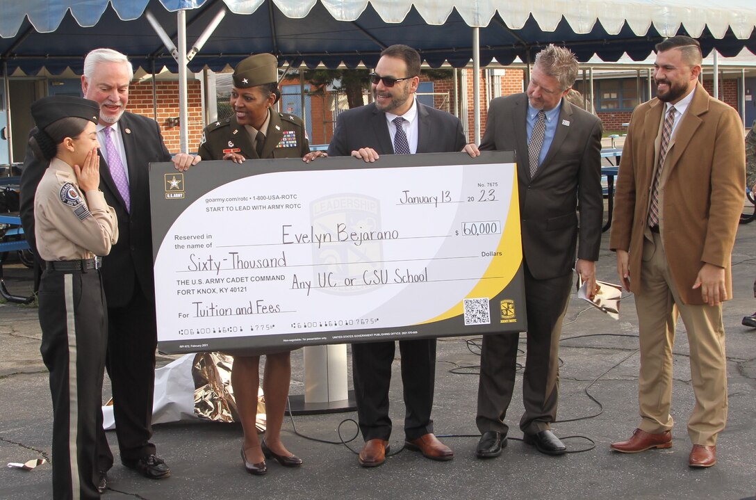 Brig. Gen. Antoinette Gant, the U.S. Army Corps of Engineers’ South Pacific Division commander, third from left, helps present a five-figure scholarship to Evelyn Bejarano, a senior at Southeast Academy in Norwalk, California, during Gant’s Jan. 13 visit to the high school.