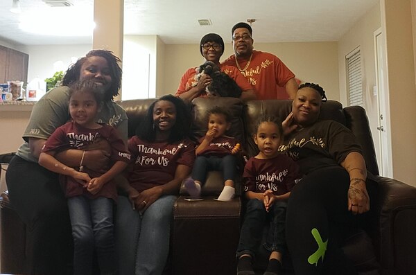 U.S. Space Force Tech. Sgt. Britney Pociatek, third from left, Space Delta 7 OL-B NCO in charge of the commander’s support staff, gathers for a family photo with her three children, two sisters and parents during Thanksgiving in Houston, Texas, Nov. 24, 2022.