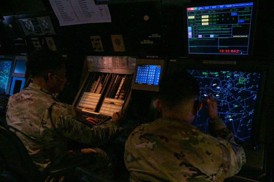 U.S. Air Force Senior Airmen Sean Mccoy and Julio Santana, 56th Operation Support Squadron radar approach control specialists monitor flight paths, Jan. 27, 2023, at Luke Air Force Base, Arizona.