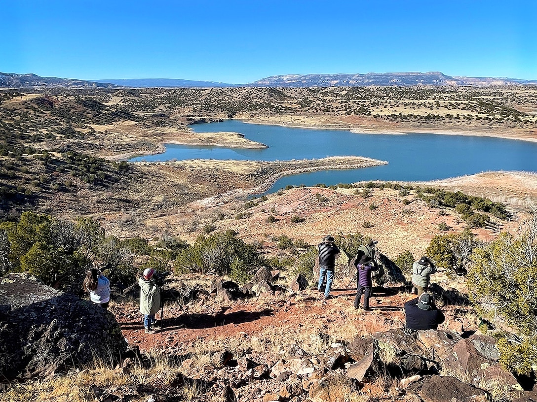 Some of the 43 volunteers who took advantage of nice weather to attend the annual Midwinter Bald Eagle Watch and Survey event held at Abiquiu Lake, Jan. 7, 2023, are pictured as they look for eagles.