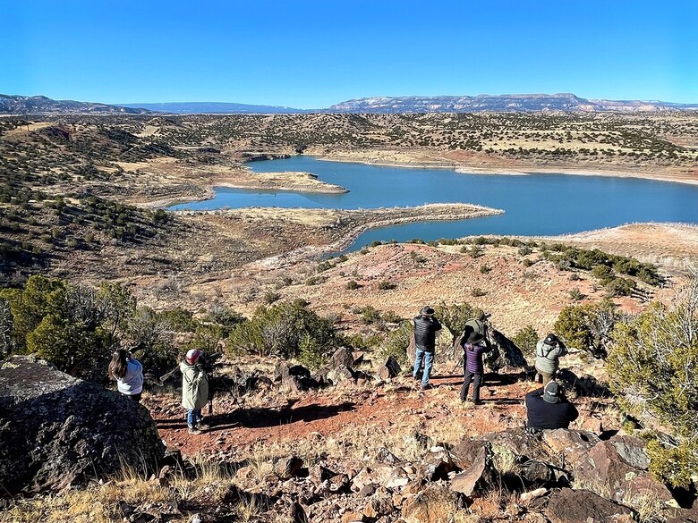 Some of the 43 volunteers who took advantage of nice weather to attend the annual Midwinter Bald Eagle Watch and Survey event held at Abiquiu Lake, Jan. 7, 2023, are pictured as they look for eagles.