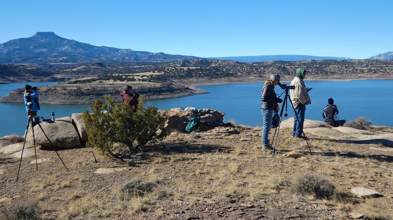 Some of the 43 volunteers who took advantage of nice weather to attend the annual Midwinter Bald Eagle Watch and Survey event held at Abiquiu Lake, Jan. 7, 2023, are pictured as they look for eagles.