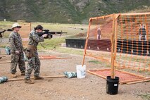 U.S. Marine Corps Sgt. Rachel Klaus, radio technician with 1st Low Altitude Air Defense Battalion, performs a shooting drill during the Marine Corps Marksmanship Competition - Pacific Shooting Team Training at Crater Range, Marine Corps Base Hawaii, Jan. 25, 2023. The MCMC-Pacific is one of four regional competitions throughout the Marine Corps in which U.S. service members and the Pacific's best shooters participate in a small arms marksmanship competition each year. (U.S. Marine Corps photo by Cpl. Holly Moore)