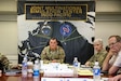 Australian Army Maj. Gen. Chris Smith, U.S. Army Pacific Deputy Commanding General Strategy and Plans (right), and New Zealand Army Brig. Gen. Rose King, New Zealand Army Deputy Chief of Staff (center), listen to a brief during the Unified Pacific Wargame Series intelligence-focused "Pacific Winds" January 26, 2023,