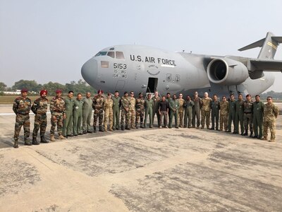 U.S. Air Force 535th Airlift Squadron and the Indian Air Force No. 81 Squadron personnel pose for a photo during Exercise COPE INDIA 2022 at Hindan Air Base, India Nov. 18, 2022. (Courtesy photo)