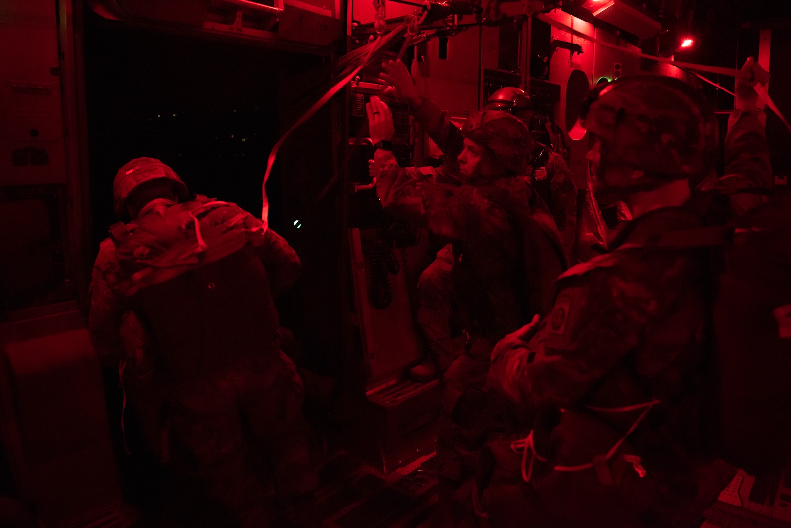 A U.S. Army soldier from the 82nd Airborne Division jumps out of a C-17 Globemaster III over North Carolina during Battalion Mass Tactical Week, Jan. 23, 2023. BMTW provides an opportunity for soldiers of Fort Bragg’s Third Brigade combat team to train in personnel drops and joint aircraft inspections in preparation for future deployments. (U.S. Air Force photo by Airman 1st Class Ryan Hayman)