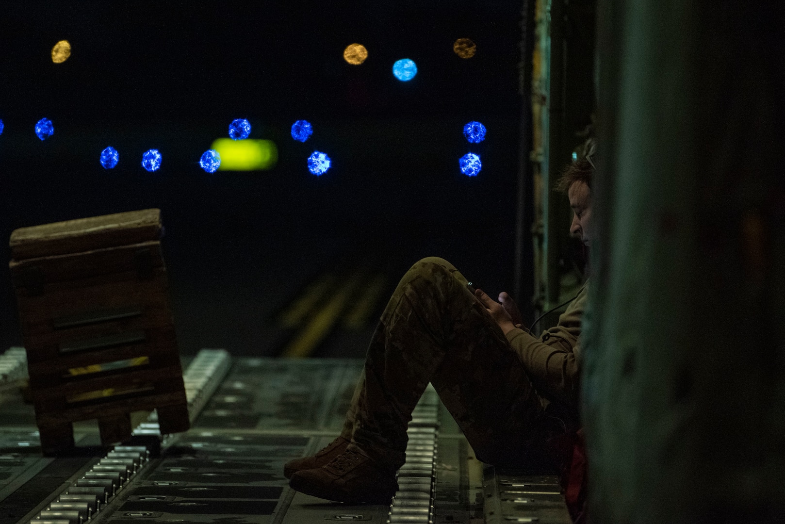 U.S. Air Force Airman 1st Class Bradley Grice, 40th Airlift Squadron loadmaster, sits inside a C-130J Super Hercules at Pope Army Airfield, North Carolina, Jan. 26, 2023. Battalion Mass Tactical Week ensured the proper training for greater experienced mission planning cells and aircrews while proactively increasing the tactical and strategic capabilities of the C-130 and C-17 Globemaster III. (U.S. Air Force photo by Airman 1st Class Ryan Hayman)