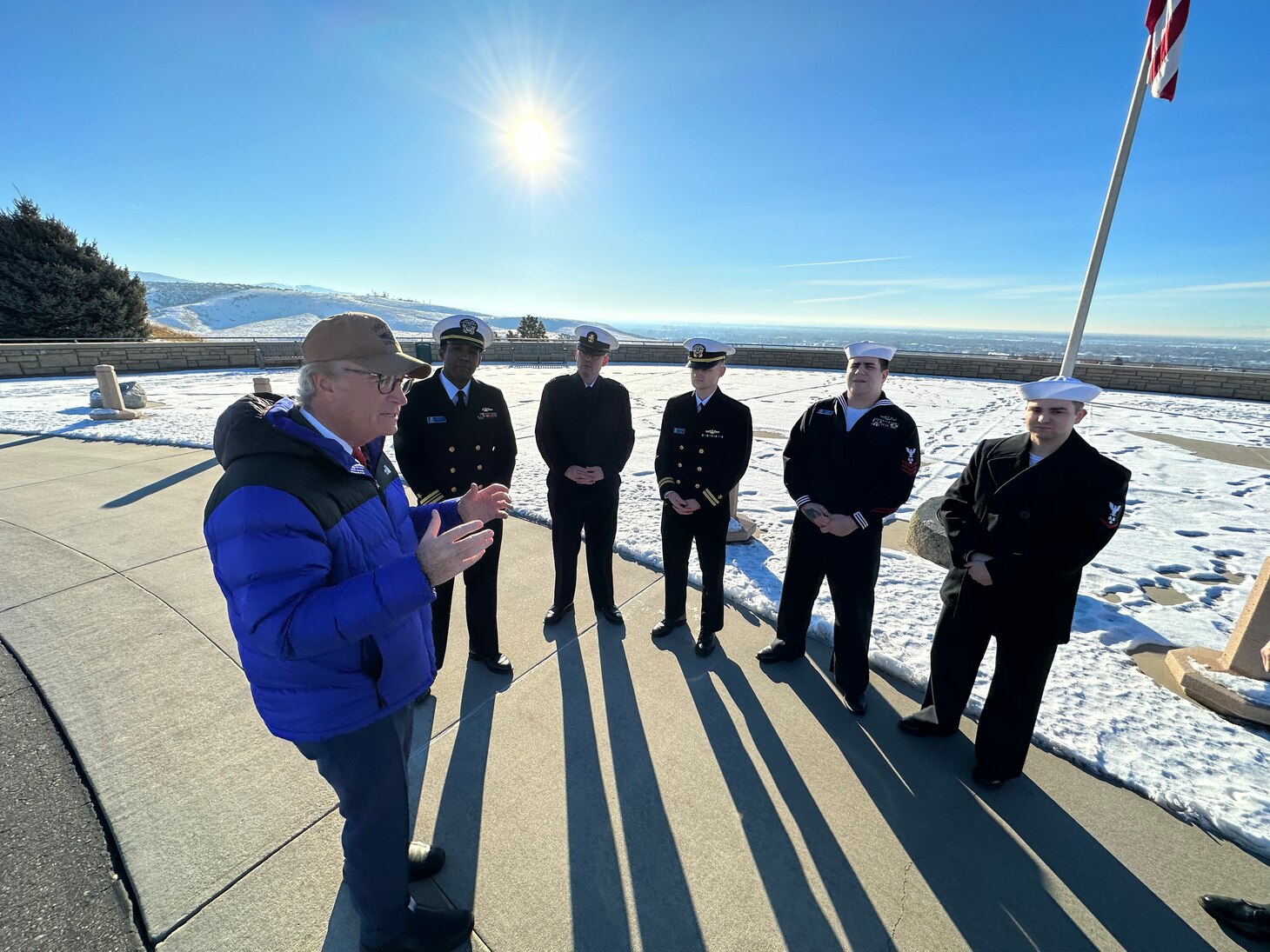 Crewmembers from the future USS Idaho (SSN 799), visit the Idaho Veterans Cemetery with former Idaho governor Dirk Kempthorne in Boise, Idaho, Jan. 24.