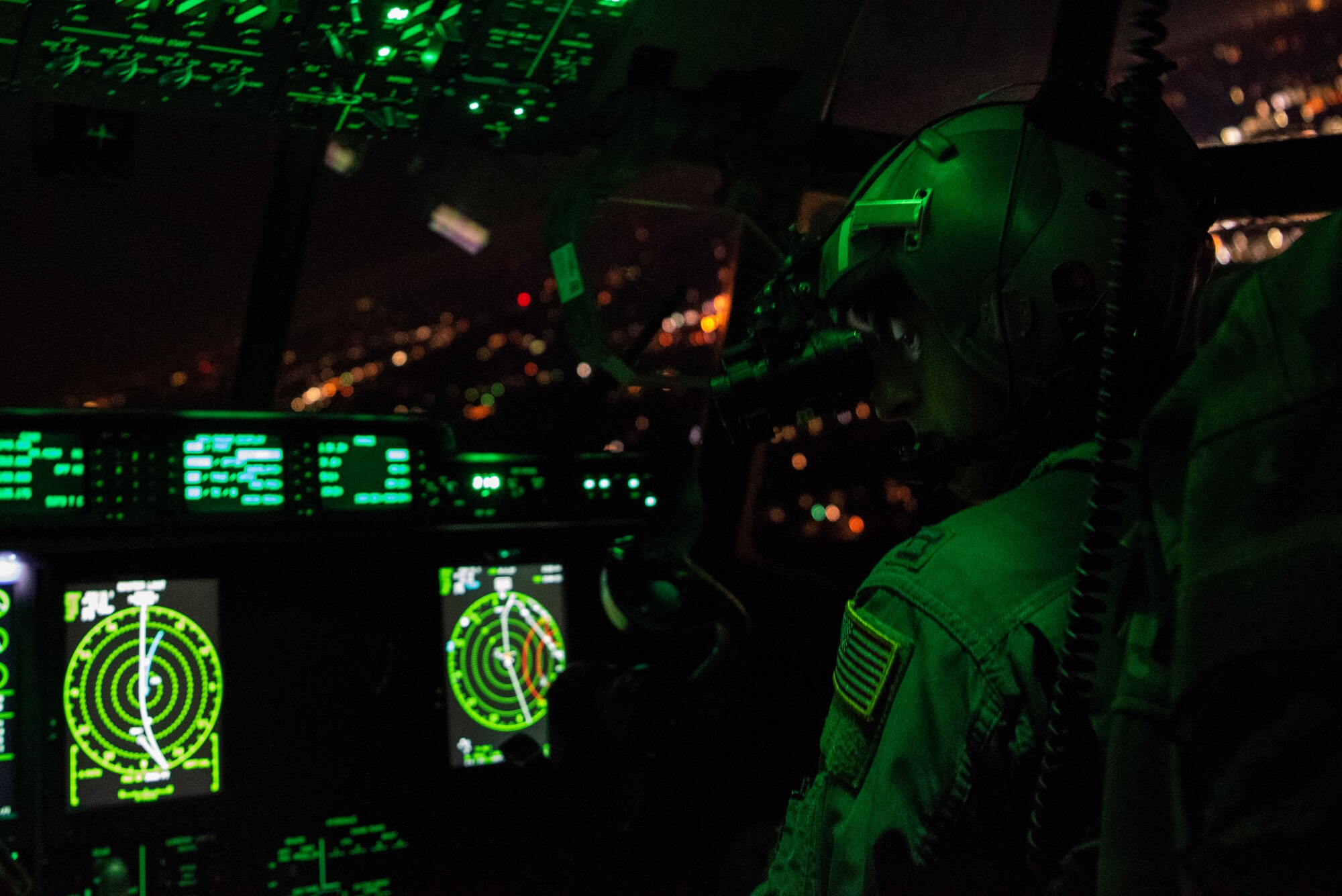 U.S. Air Force Capt. James Wishart, 40th Airlift Squadron co-pilot, flies over North Carolina during Battalion Mass Tactical Week, Jan. 24, 2023. During BMTW, Wishart and his aircrew dropped personnel, heavy equipment and Container Delivery System bundles containing supplies for ground personnel within the drop zone. (U.S. Air Force photo by Airman 1st Class Ryan Hayman)