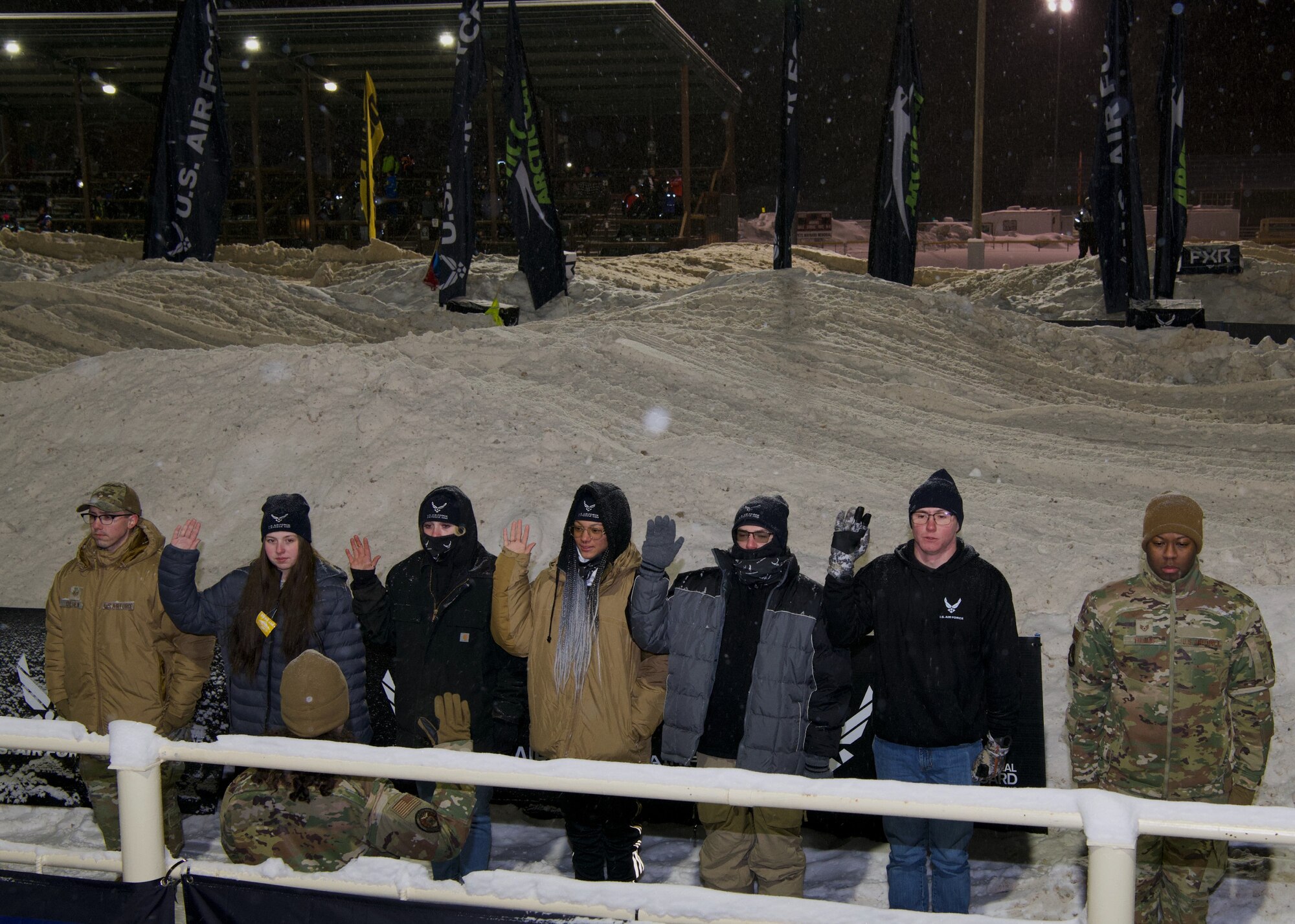 Brig. Gen. Lisa Craig conducts the Oath of Enlistment to a group of delayed entry personnel.