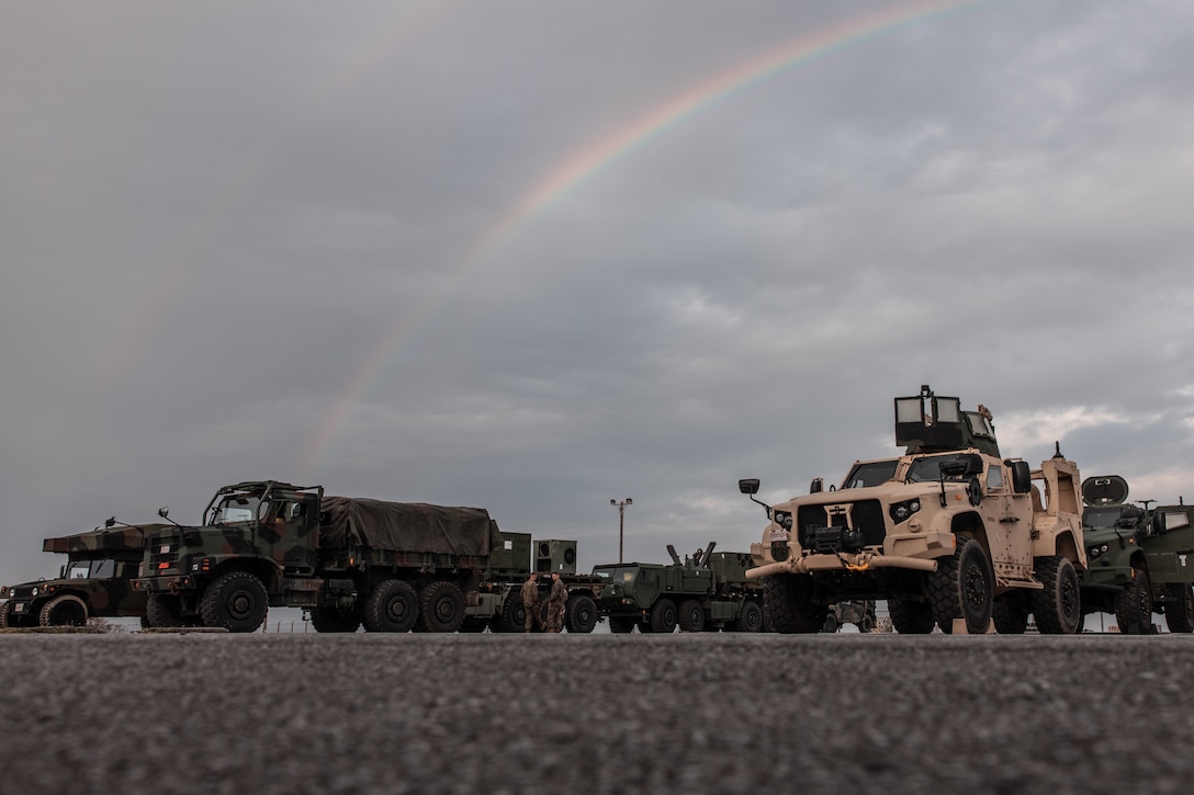 U.S. Marines and Sailors with 3rd Marine Logistics Group (MLG) stage tactical vehicles in preparation for an Alert Contingency Marine Air-Ground Task Force (ACM) drill at Kadena Air Base, Okinawa, Japan, Jan. 11, 2023. 3rd MLG personnel conducted the ACM exercise to prepare to react quickly to a crisis, counter potential threats, and assist allies and partners throughout the Indo-Pacific region in maintaining regional stability. 3rd MLG, based out of Okinawa, Japan, is a forward-deployed combat unit that serves as III Marine Expeditionary Force’s comprehensive logistics and combat service support backbone for operations throughout the Indo-Pacific area of responsibility. (U.S. Marine Corps photo by Lance Cpl. Sydni Jessee)