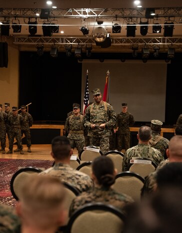 U.S. Marine Corps Col. Erik Smith, commanding officer of 3rd Sustainment Group (Experimental), speaks during a relief and appointment ceremony on Camp Kinser, Okinawa, Japan, Jan. 30, 2023. The relief and appointment ceremony acknowledged the efforts put into the unit by Sgt. Maj. Charles B. Peoples during his time as the 3rd SGX Sergeant Major and welcomed Sgt. Maj. Rupert K. Palmer into the unit. (U.S. Marine Corps photo by Cpl. Moises Rodriguez)