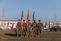 U.S. Marines and a Sailor with the 3rd Marine Logistics Group (MLG) color guard stand at parade rest during a change of command ceremony at Camp Foster, Okinawa, Japan, Jan. 31, 2023. During the ceremony, Capt. Darryl Arfsten, the outgoing commanding officer, relinquished command of 3rd Medical Battalion to Capt. Justin C. Logan, the oncoming commanding officer. 3rd MLG, based out of Okinawa, Japan, is a forward-deployed combat unit that serves as III Marine Expeditionary Force’s comprehensive logistics and combat service support backbone for operations throughout the Indo-Pacific area of responsibility. (U.S. Marine Corps photo by Lance Cpl. Sydni Jessee)