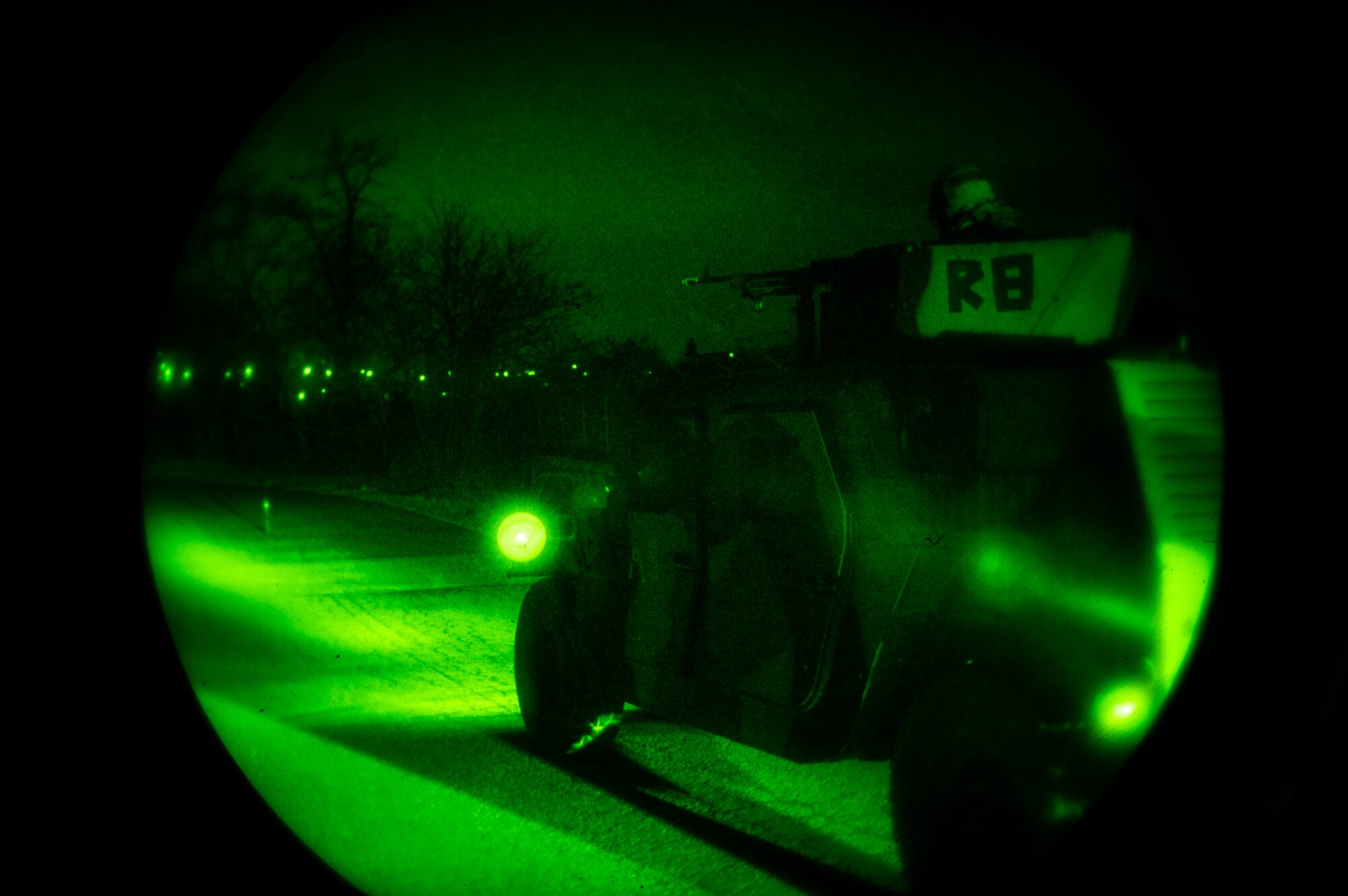 A U.S. Air Force Humvee, 51st Security Forces Squadron, stops before coming in contact with a simulated unexploded ordnance (UXO) during a night-time defend-the-base training scenario at Osan Air Base, Republic of Korea, Jan. 31 2023. UXOs can pose a serious threat to defense operations as they can be set off unexpectedly, potentially exploding and or releasing Chemical, Biological, Radioactive and Nuclear (CBRN) agents. When discovering a UXO members must keep a safe distance, report their findings to Base Defense Operations Center and establish a cordon around the UXO. (U.S. Air Force photo by Airman 1st Class Aaron Edwards)