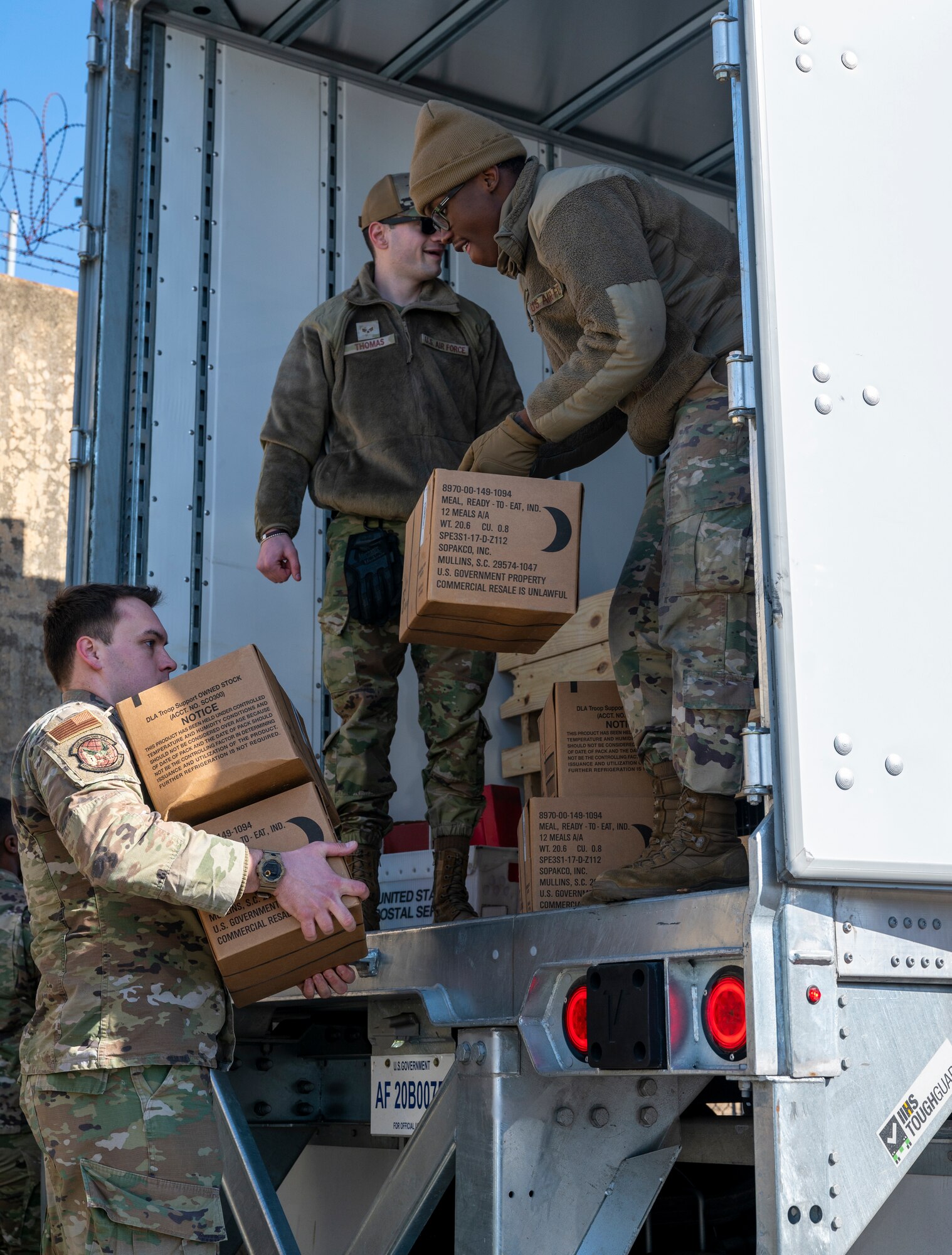 U.S. Air Force Airmen, 51st Fighter Wing, unload meal ready-to-eat boxes during a training event at Daegu Air Base, Republic of Korea, Jan. 30, 2023.