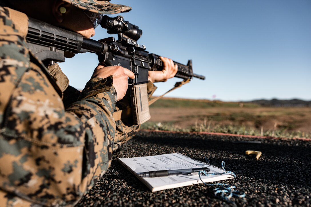 A U.S. Marine Corps recruit with Hotel Company, 2nd Recruit Training Battalion, takes aim with his rifle during a table one course of fire at Marine Corps Base Camp Pendleton, California, Jan. 31, 2023. The table one course of fire covered the basic fundamentals of marksmanship and rifle safety. (Marine Corps photo by Lance Cpl. Devereux)