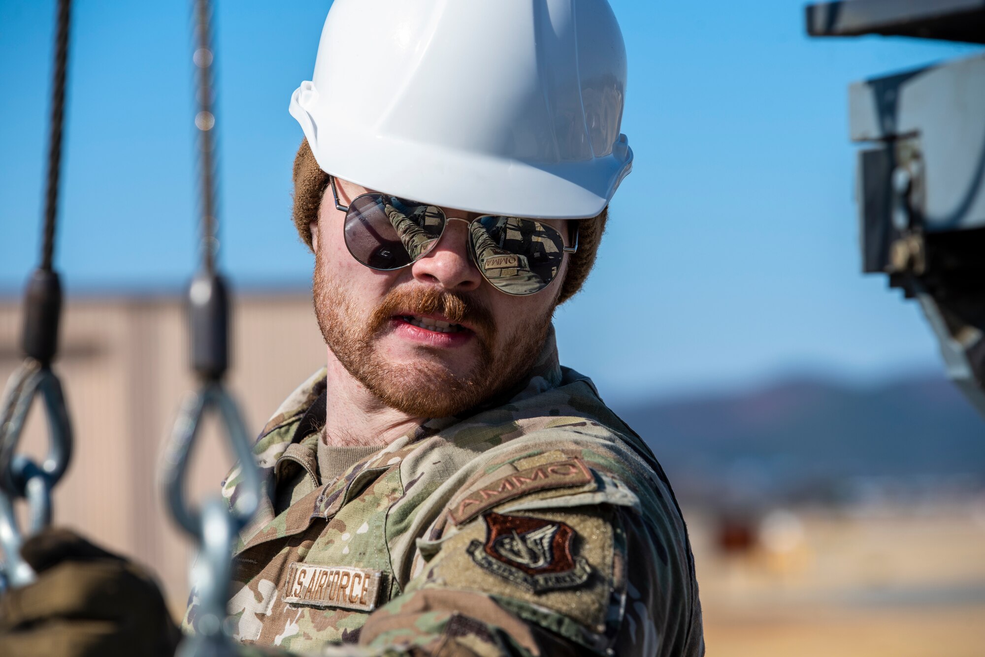 U.S. Air Force Staff Sgt. Joshua Sandy, 51st Munitions Squadron (MUNS) munitions inspector, loads a simulated GBU-38 Joint Direct Attack Munition during a training event at Daegu Air Base, Republic of Korea, Jan. 30, 2023.