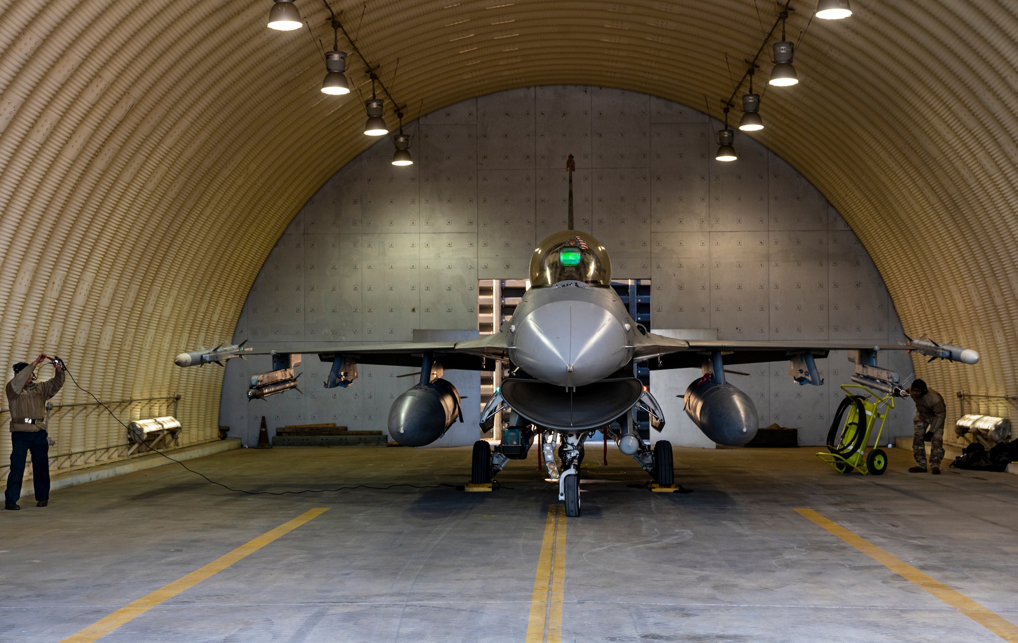 U.S. Air Force 36th Fighter Generation Squadron Airmen, perform pre-flight checks on an F-16 Fighting Falcon during a training event at Daegu Air Base, Republic of Korea, Jan. 31, 2023.