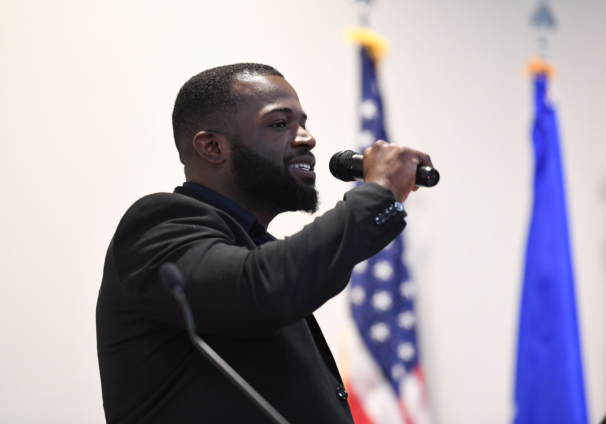 Josiah Ward performs a song selection during the annual Dr. Martin Luther King Jr. Luncheon inside the Roberts Consolidated Aircraft Maintenance Facility at Keesler Air Force Base, Mississippi, Jan. 30, 2023.