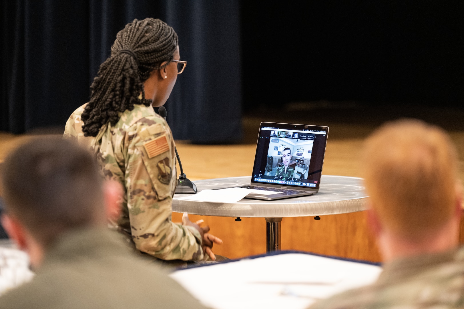 Airman looking at laptop screen