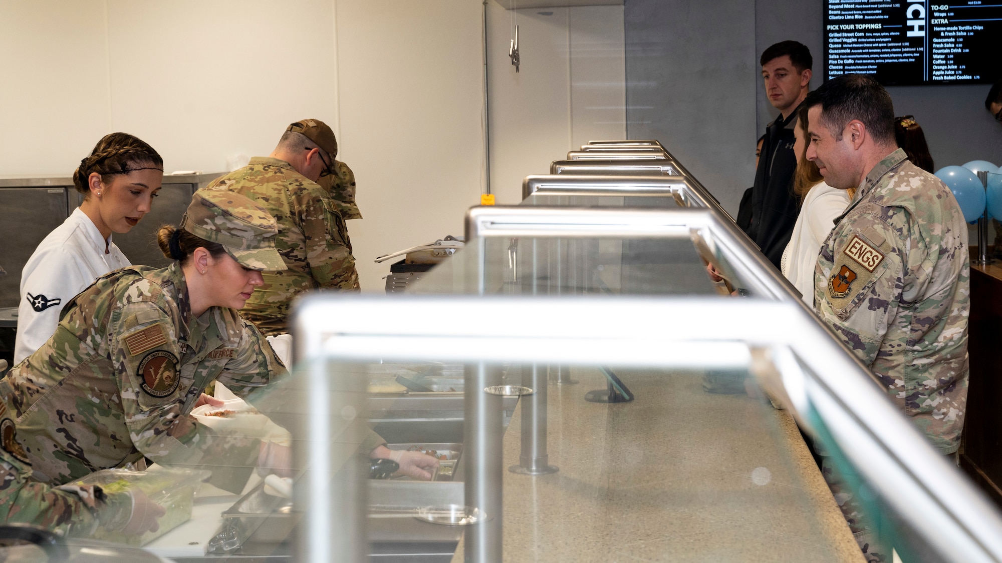 Airmen from the 49th Wing order food at the 49er Cafe, Holloman Air Force Base, New Mexico, Feb. 1, 2023.