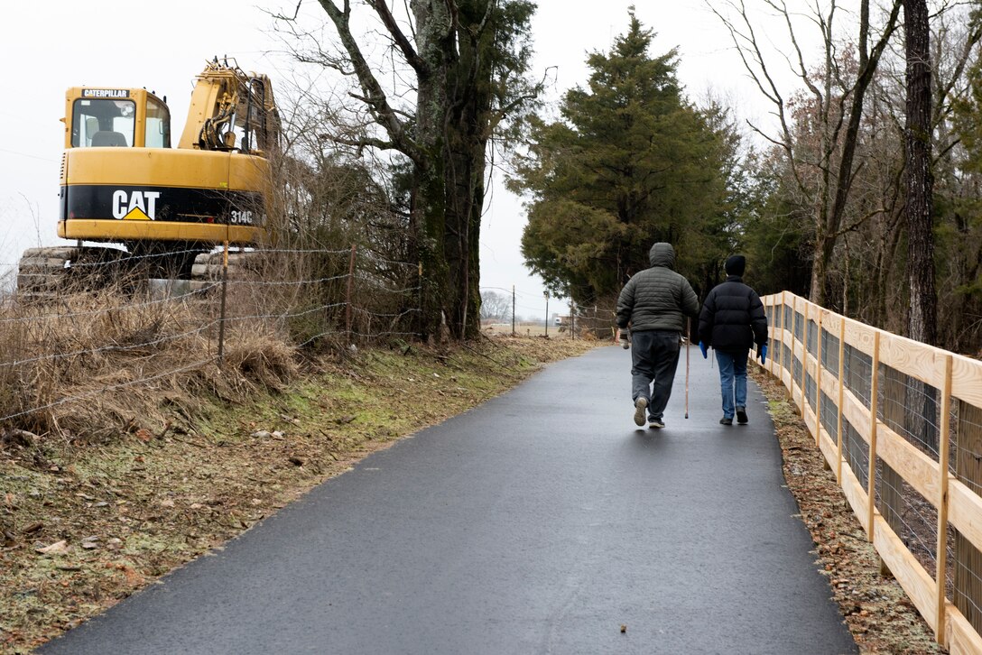 A couple hikes on the new stretch of greenway following the dedication of phase two of the North Murfreesboro Greenway Project Jan. 31, 2023, at the Walter Hill Trailhead in Murfreesboro, Tennessee. The U.S. Army Corps of Engineers Nashville District constructed two additional miles of paved pedestrian trails along the North Murfreesboro Greenway and made improvements to the popular 18-mile Twin Forks Equestrian Trail. (USACE Photo by Lee Roberts)