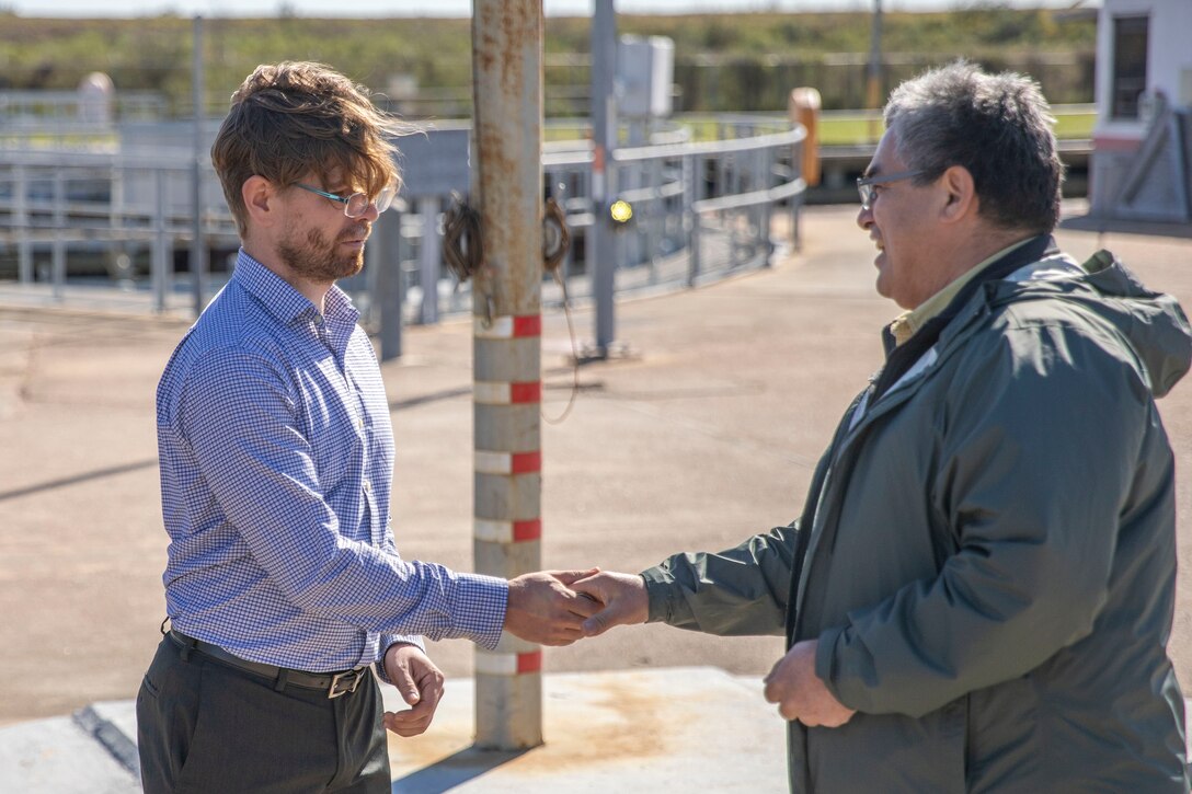 two people shaking hands