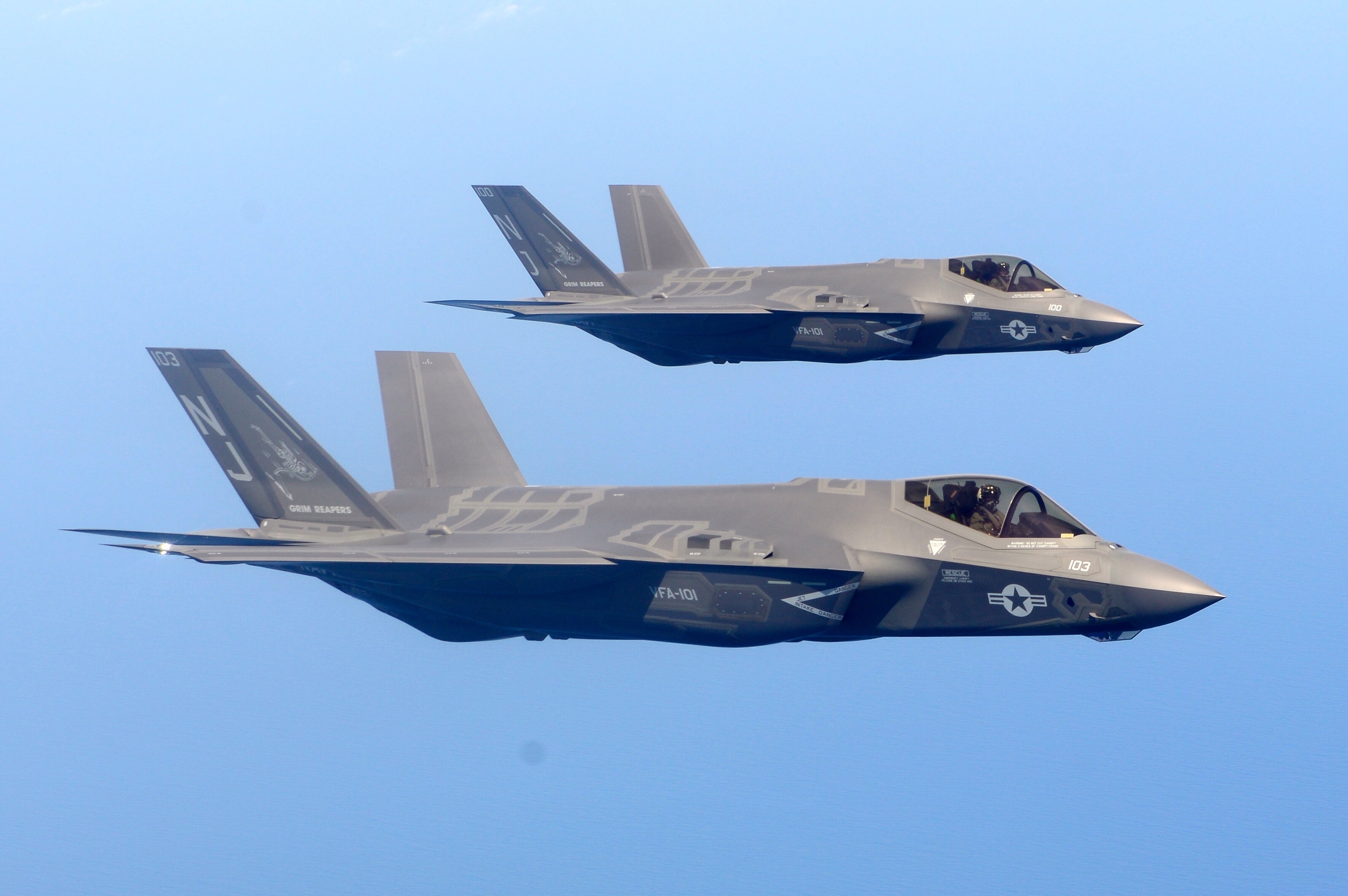 Two Navy F-35Cs fly at the left wing observation position during a training mission near Eglin Air Force Base, Fla.