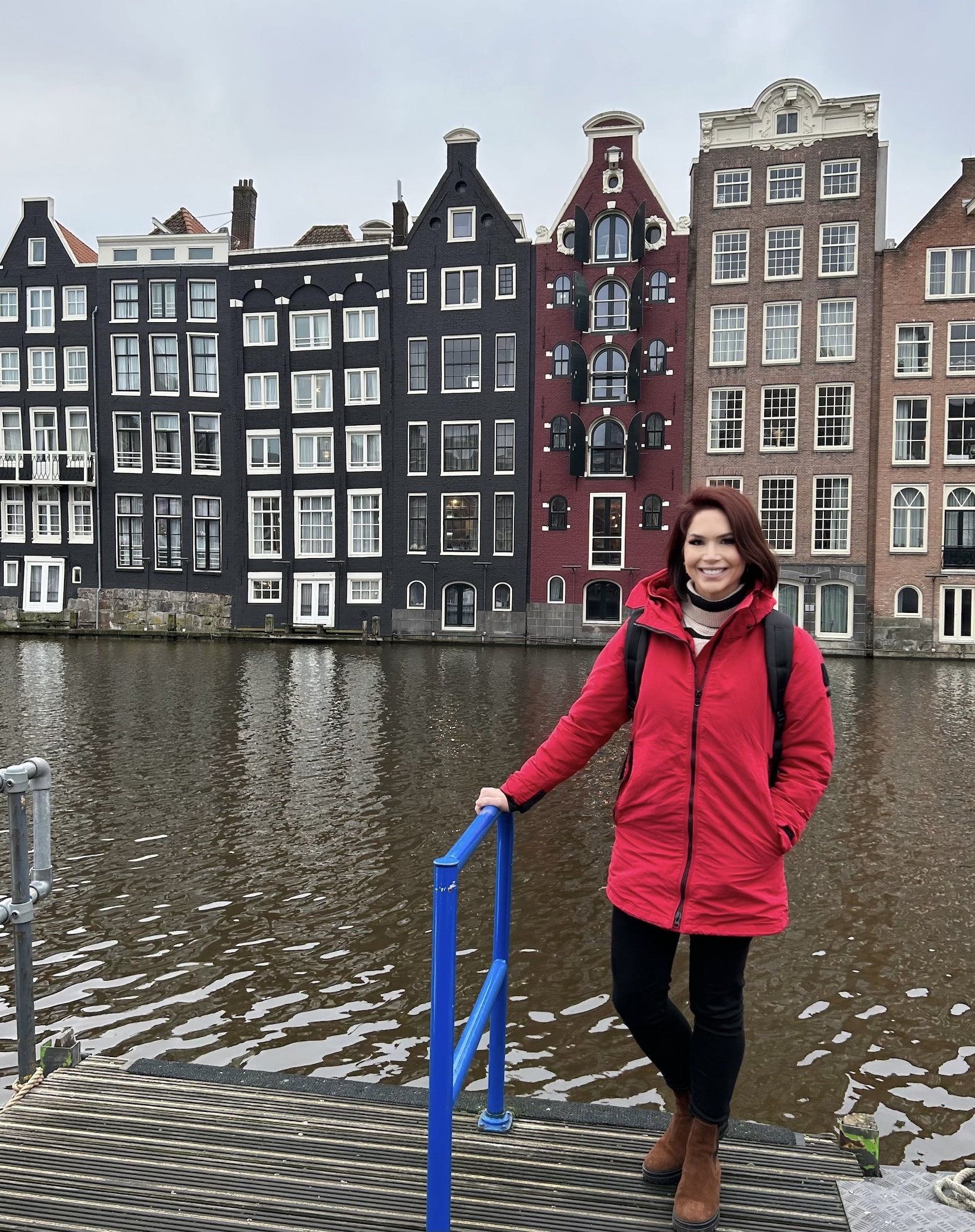 female standing in front of building in the Netherlands