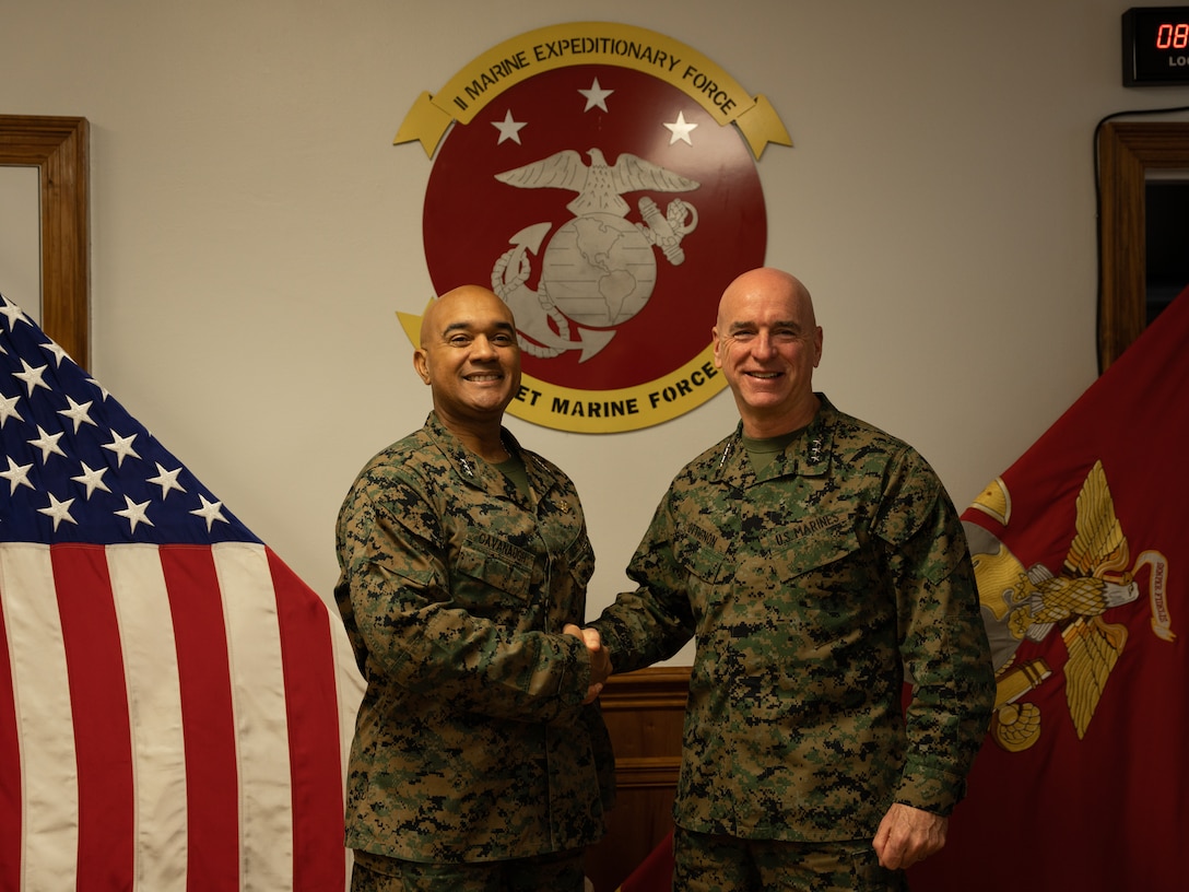 U.S. Marine Corps Lt. Gen. Brian W. Cavanaugh, left, the commanding general of Fleet Marine Force, Atlantic, Marine Forces Command, Marine Forces Northern Command, greets Lt. Gen. David Ottignon, right, the commanding general of II Marine Expeditionary Force (II MEF), Marine Corps Base Camp Lejeune, North Carolina, Feb. 1, 2023. Cavanaugh and respective leadership visited II MEF to tour subordinate commands, discuss capabilities, innovations and meet with Marines. (U.S. Marine Corps photo by Cpl. Hannah Adams)