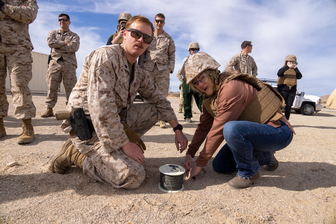 U.S. Marine Corps Sgt. Austin F. Howard oversees a detonation during family day