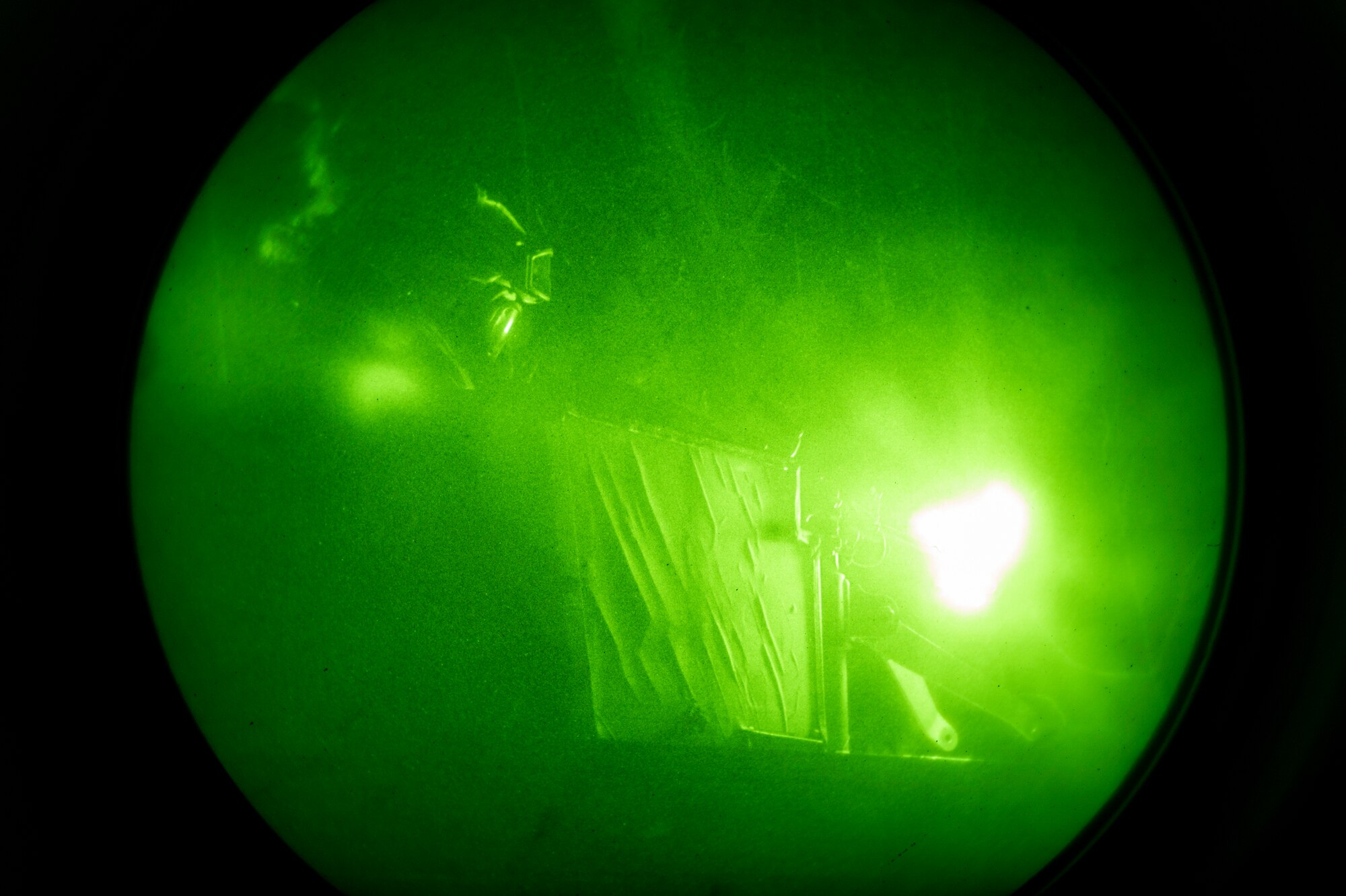 U.S. Air Force 51st Security Forces Squadron Defender, fires an M240 machine gun from a Humvee at simulated opposing forces (OPFOR) during a night-time base defense training scenario at Osan Air Base, Republic of Korea, Jan. 31, 2023. Humvee gunners are responsible for providing the first line of defense for the vehicle and their team through surveillance, target acquisition and engagement of OPFOR with lethal force. (U.S. Air Force photo by Airman 1st Class Aaron Edwards)