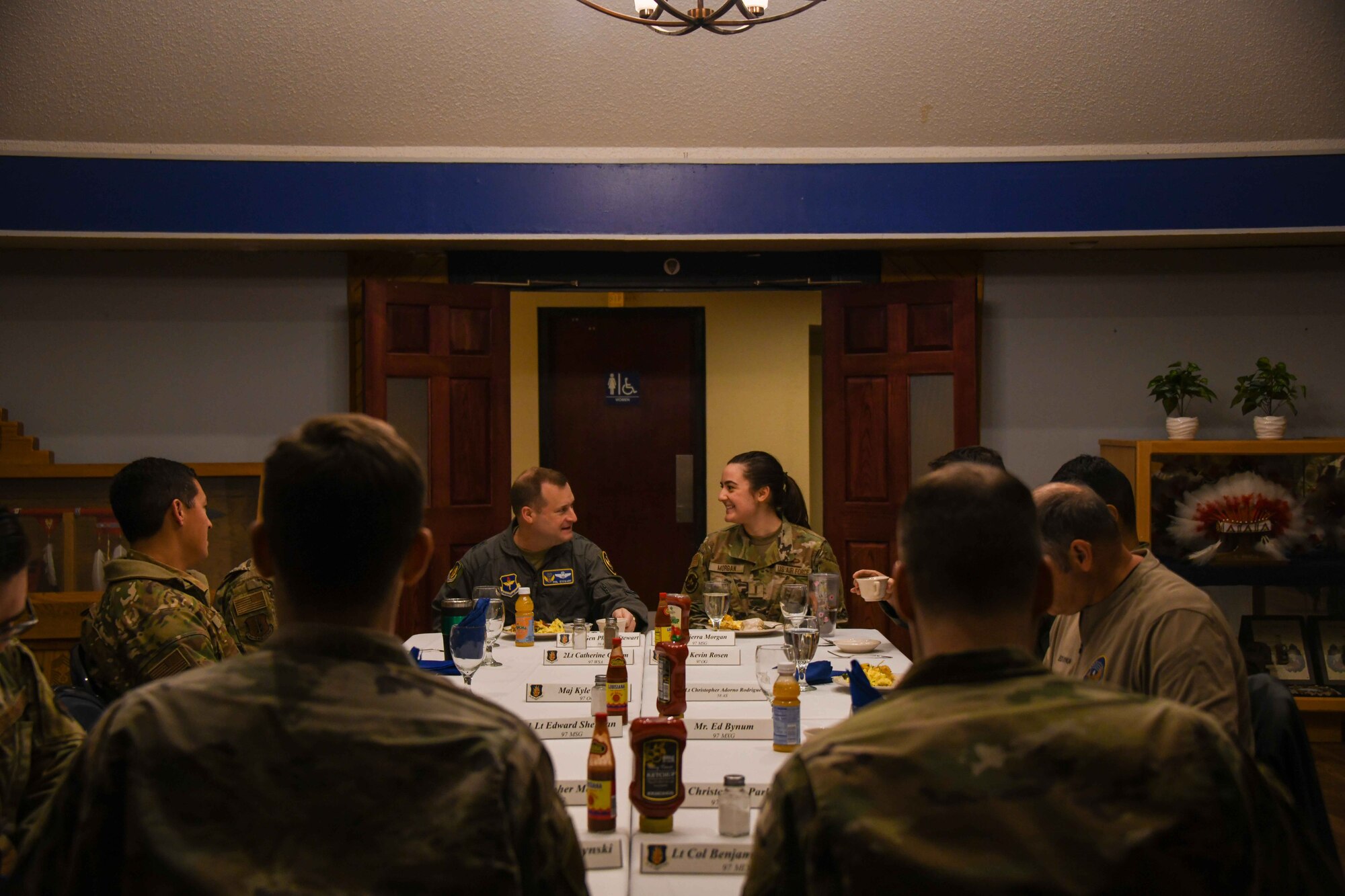 U.S. Air Force Maj. Gen. Phillip Stewart, center left, 19th Air Force commander, joins company grade officers for a breakfast hosted at Club Altus at Altus Air Force Base, Oklahoma, Jan. 27, 2023. The officers were able to ask Stewart questions while they all shared experiences and mentorship tips during breakfast. (U.S. Air Force photo by Airman 1st Class Kari Degraffenreed)