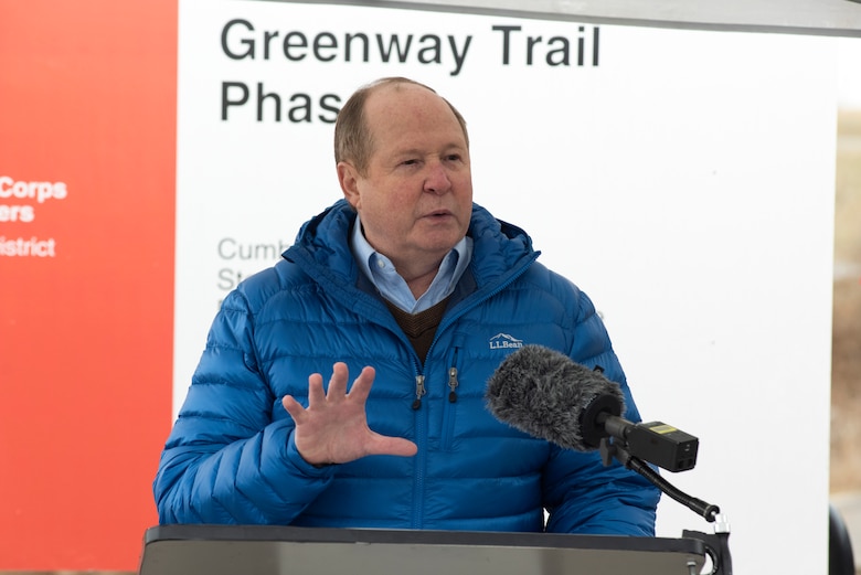 Kent Syler, political science professor at Middle Tennessee State University and chairman of Special Projects as a member of the Murfreesboro Parks and Recreation Commission, lauds former Sen. Lamar Alexander and the U.S. Army Corps of Engineers for their support and work on the newest extension of the North Murfreesboro Greenway during a dedication ceremony Jan. 31 at the Walter Hill Trailhead in Murfreesboro, Tennessee. (USACE Photo by Lee Roberts)