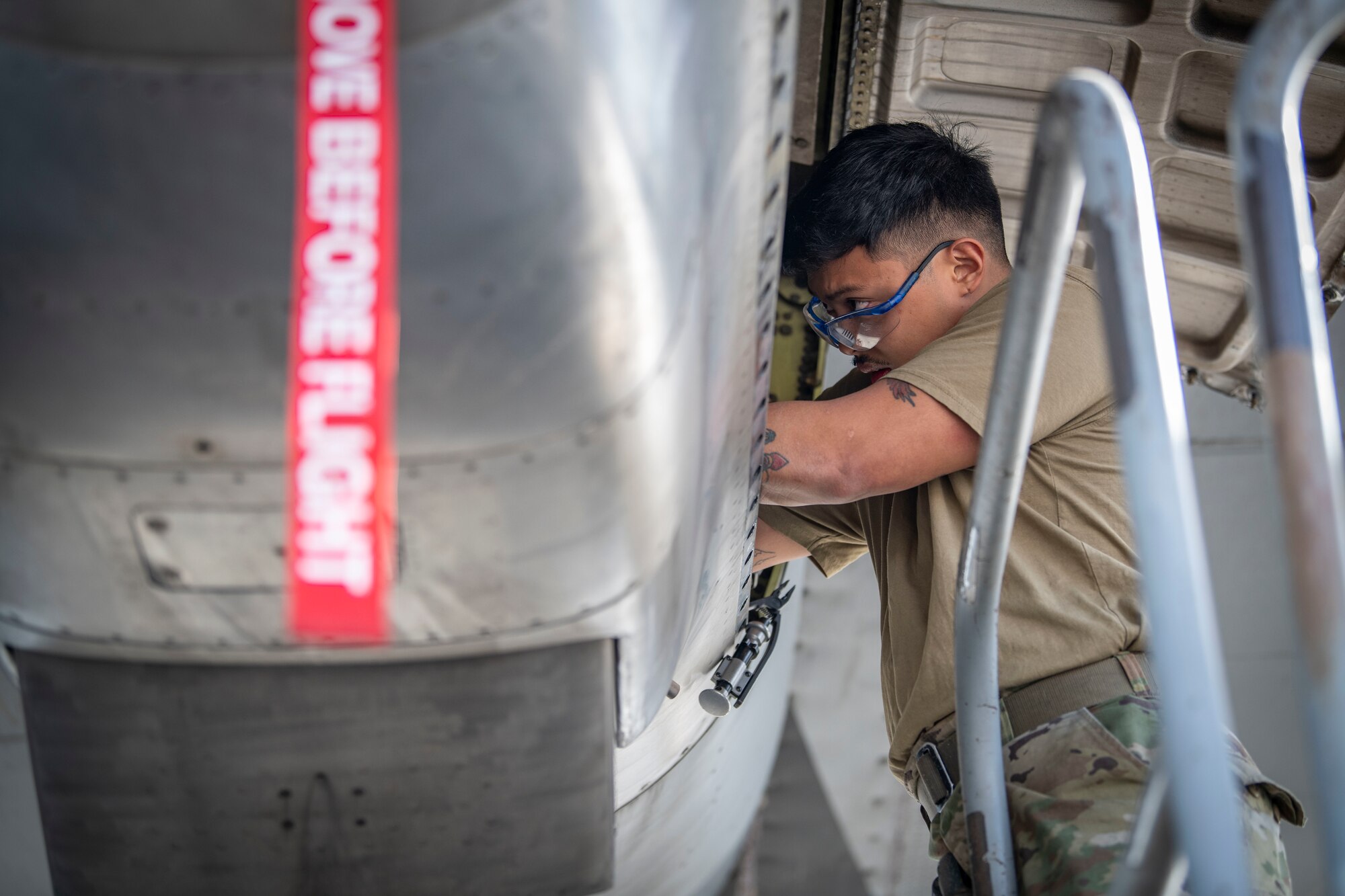 U.S. Air Force Senior Airman Raeven Sagun, a 386th Expeditionary Aircraft Maintenance Squadron aerospace propulsion technician, works on a C-130 Hercules at Ali Al Salem Air Base, Kuwait, Feb. 2, 2023.