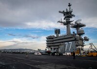The Nimitz-class aircraft carrier USS George H.W. Bush (CVN 77), along with the embarked staff of Carrier Strike Group (CSG) 10, arrives in Piraeus, Greece, for a scheduled port visit, Feb. 3, 2023.